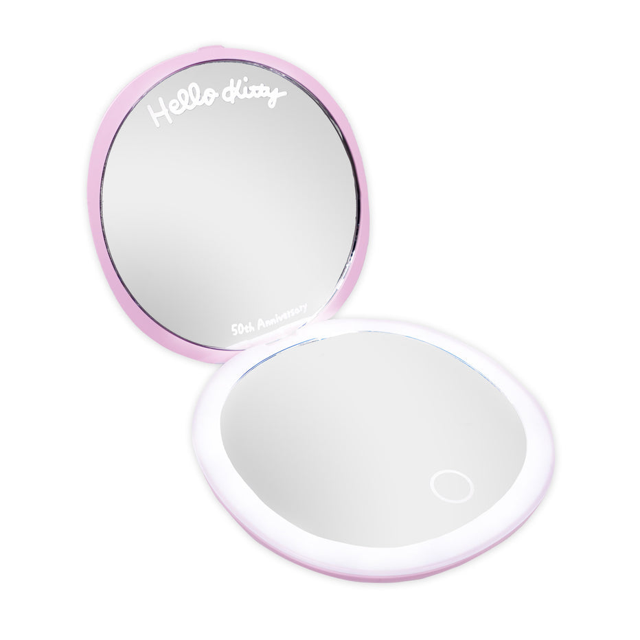 Impressions Vanity Hello Kitty Espejo personal compacto Luz led y aumento. Recargable