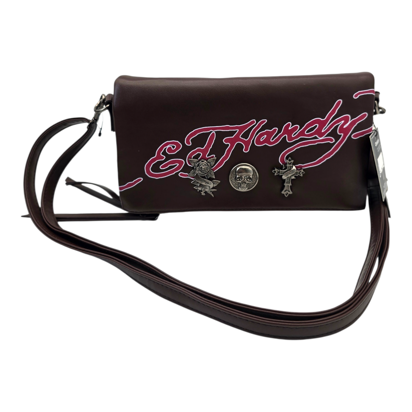 Bolsa Clutch sobre café Ed Hardy