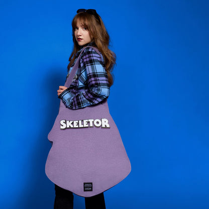 ⚠️PREVENTA IMPORTACIÓN Tote Bolsa Skeletor Cakeworthy brilla en la obscuridad *Se enviará alrededor de 15 a 20 días habiles después de su compra* Masters of the Universe