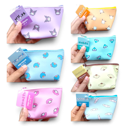 Bolsita tipo monedero multiusos Sanrio medida aprox 7.5x8x5 cms